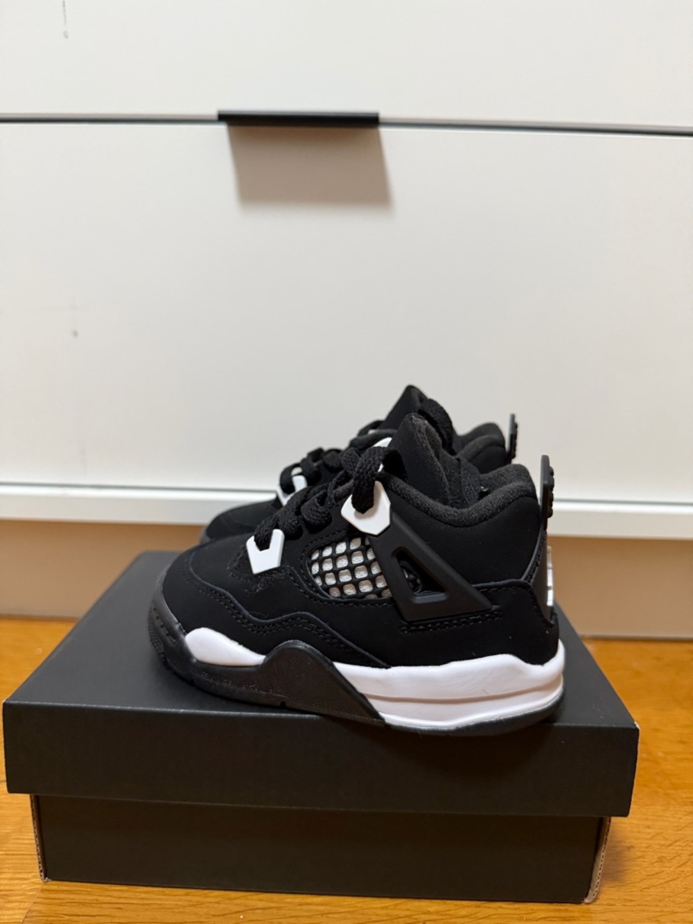 Jordan Kids' Black and White Retro High-Top Sneakers